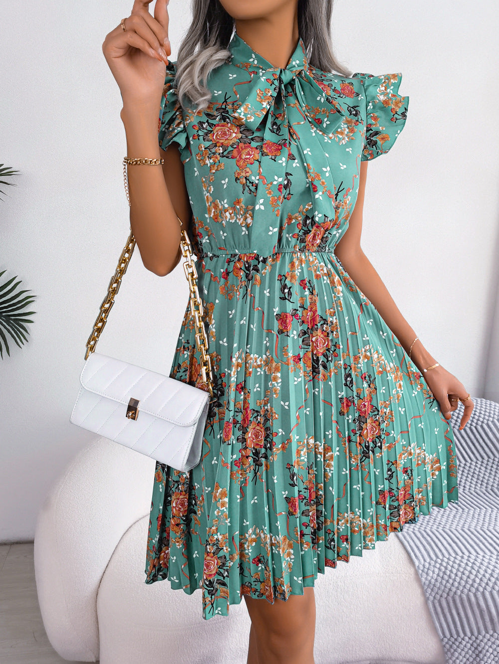 Pleated Floral Printed Tie Neck Knee Length Dress Trendsi